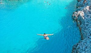 cliff diving, blue waters 