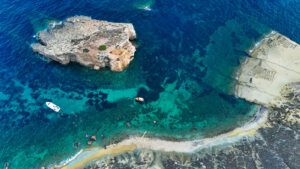 Halfa Zriezaq secluded beaches South Gozo Malta crystal clear blue water perfect for private boat tour swimming and snorkeling away from crowds
