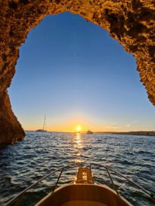 Lovers Cave near Comino Malta, showing rocky cave entrance and clear blue water, a romantic stop reached by private boat.