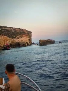 Collapsed Kissing Elephants Arch rock formation in Comino, Malta
